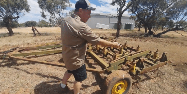 green and yellow ryan scaravator trashavator brim 2 history of agriculture in australia